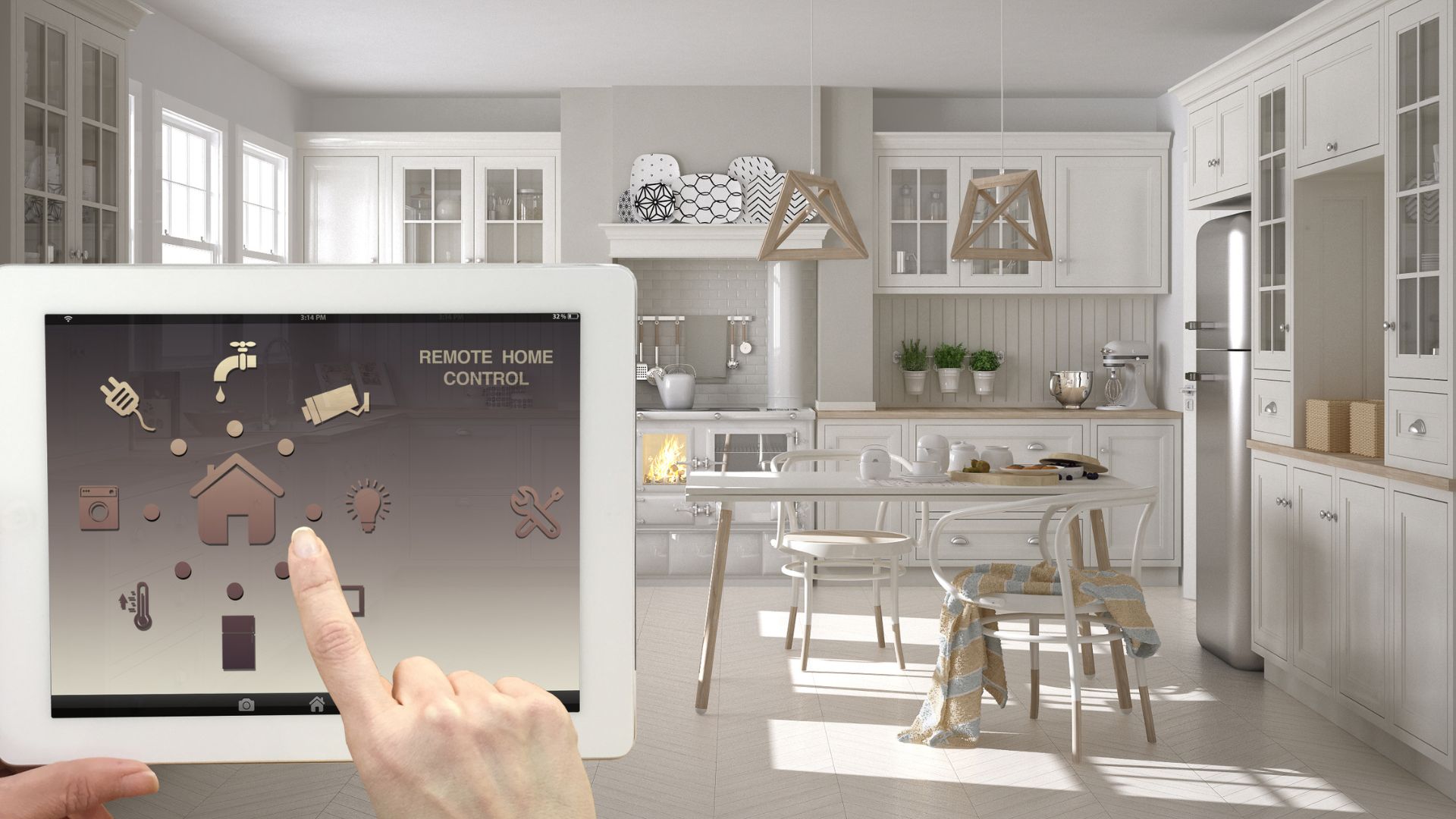 A person is holding a tablet in a kitchen